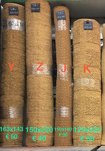 Moquette di fibra naturale di colore ocra e marrone modelli: Y, Z, J e K